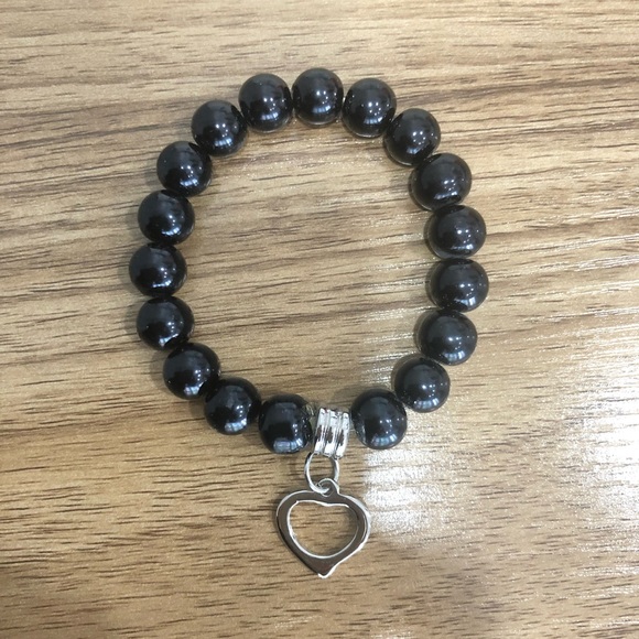 Three beaded bracelets with pendants - Picture 4 of 4